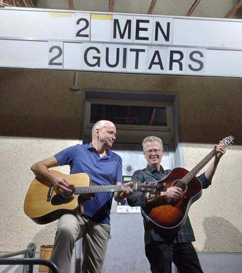 (c) 2 MEN 2 GUITARS